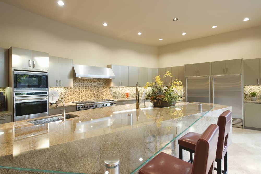 Recessed lighting within a modern kitchen